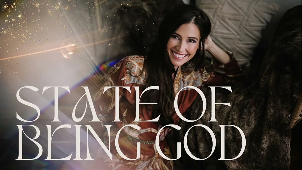 Solara Rose reclining in a rust and gold silk robe beneath the words State of Being God
